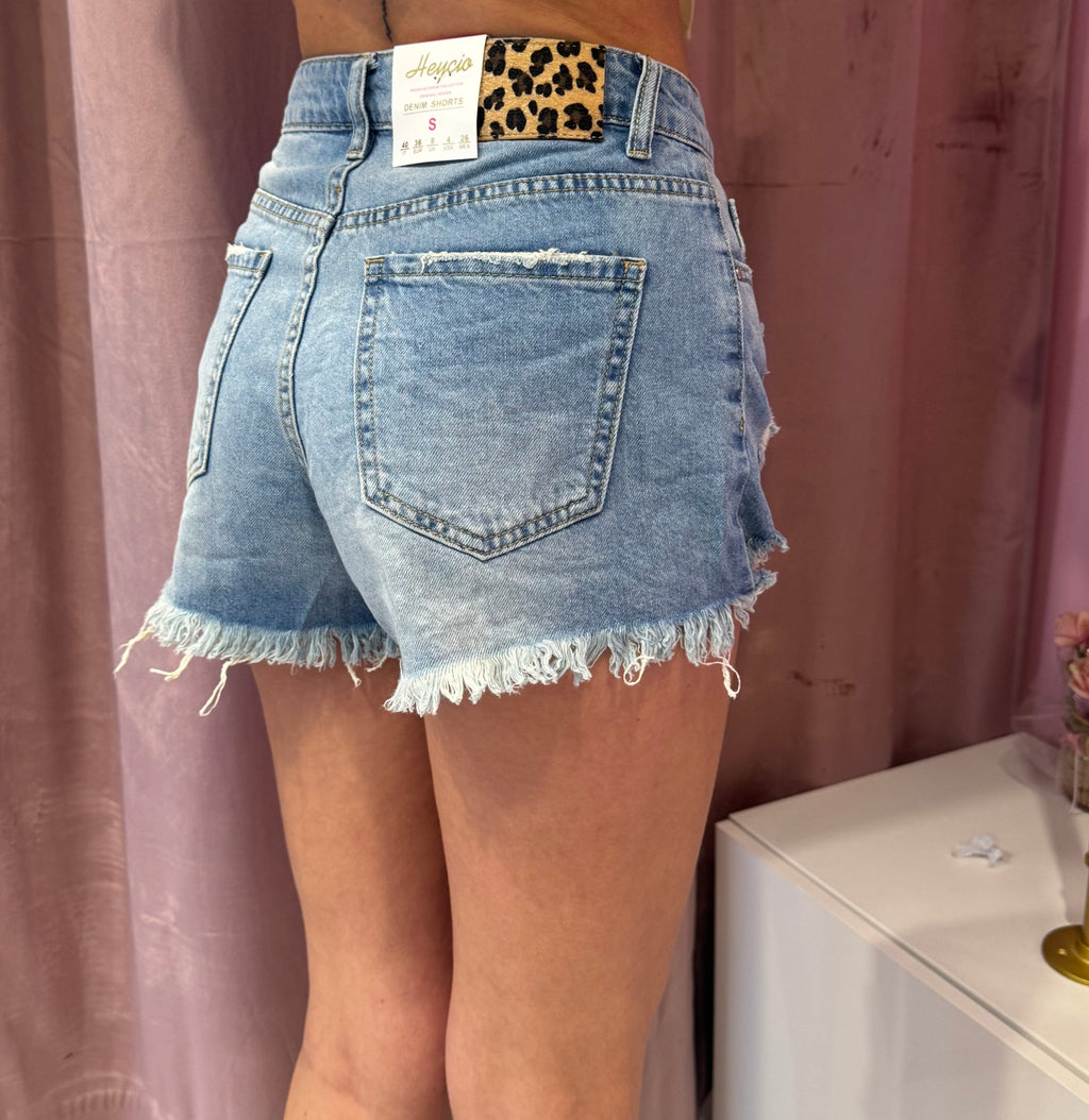 Pantaloncino di jeans lavaggio chiaro
