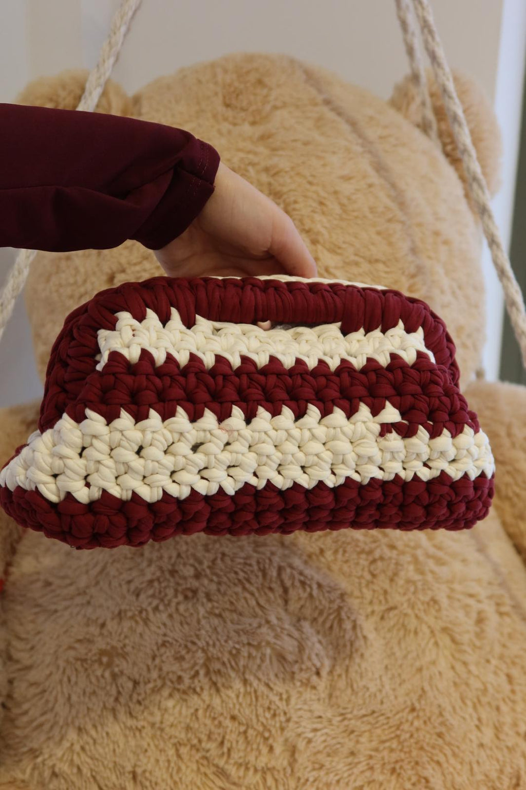 Mini pochette con striature bicolore